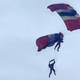Illustration for article titled Red Devils Parachute Team Members Work Together To Survive Entanglement